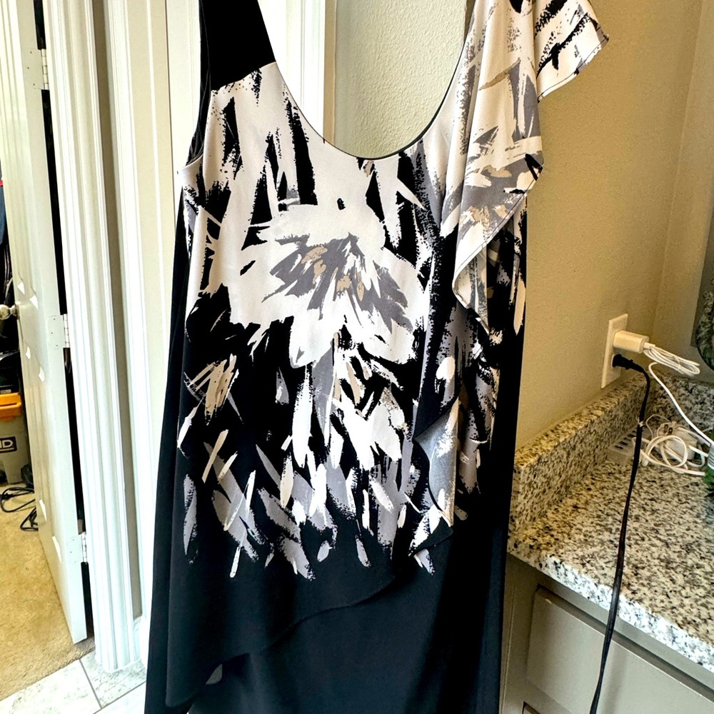 Summer dressed with tiered overlay on one shoulder